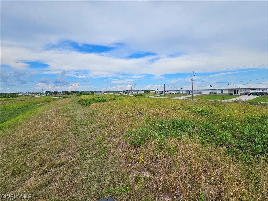 Undisclosed Address LaBelle, FL 33935 - Photo 11 of 14 a view of an ocean and a yard
