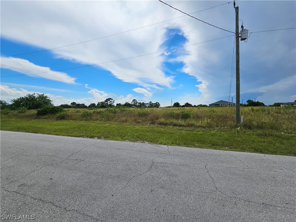 Undisclosed Address LaBelle, FL 33935 - Photo 5 of 14 a view of a lake with a big yard