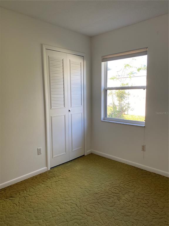 5047 Ferncrest Drive Winter Park, FL 32792 - Photo 20 of 34 a view of an empty room with a window