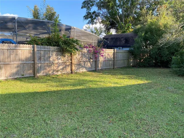 a view of a door and chair in a room