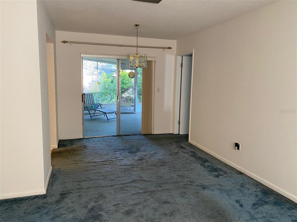 5047 Ferncrest Drive Winter Park, FL 32792 - Photo 6 of 34 a view of an empty room with a window