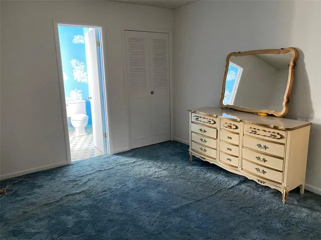 a living room with furniture and flat screen tv