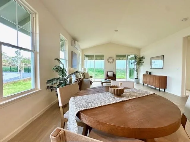 a bathroom with a shower and a tub