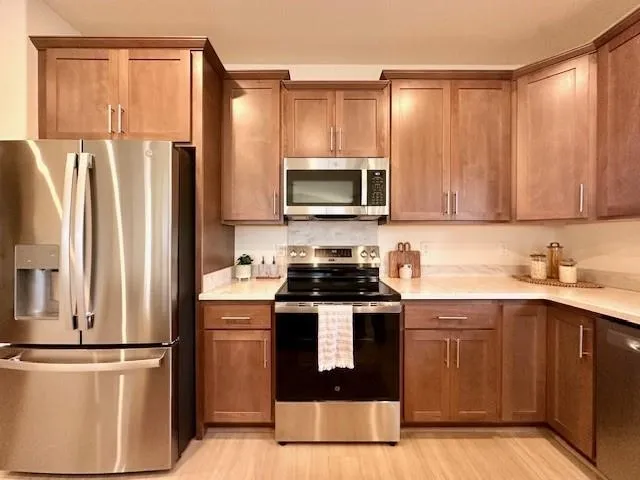 a bathroom with a sink double vanity and a mirror