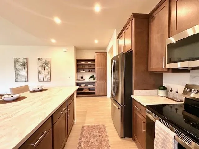 a view of utility room with a sink washer and dryer
