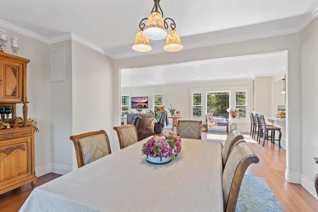 a bedroom with furniture and a chandelier