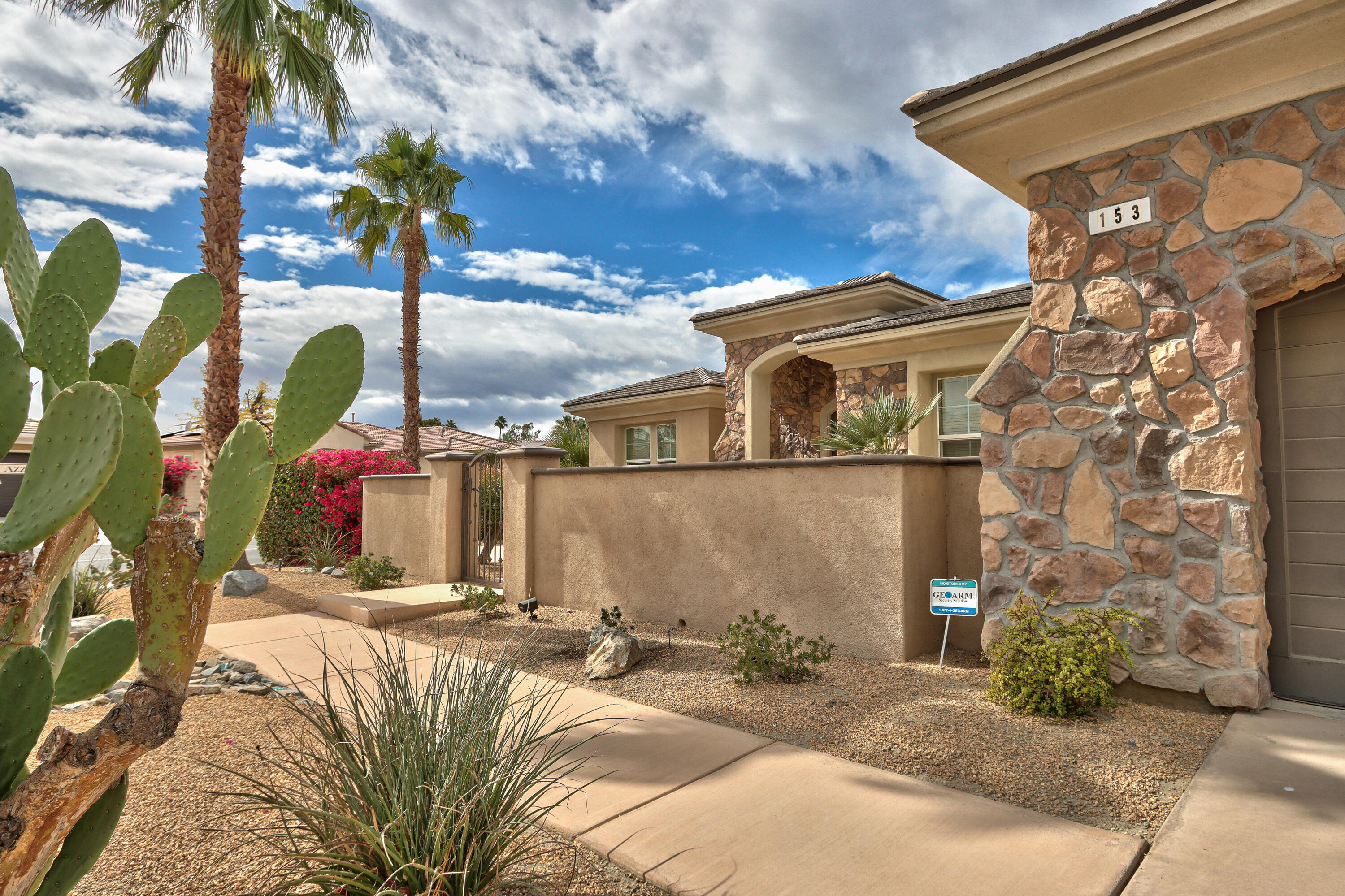 153 Merano Way Palm Desert, CA 92211 - Photo 5 of 39 7-Front