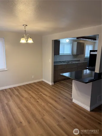 a room with furniture and a chandelier