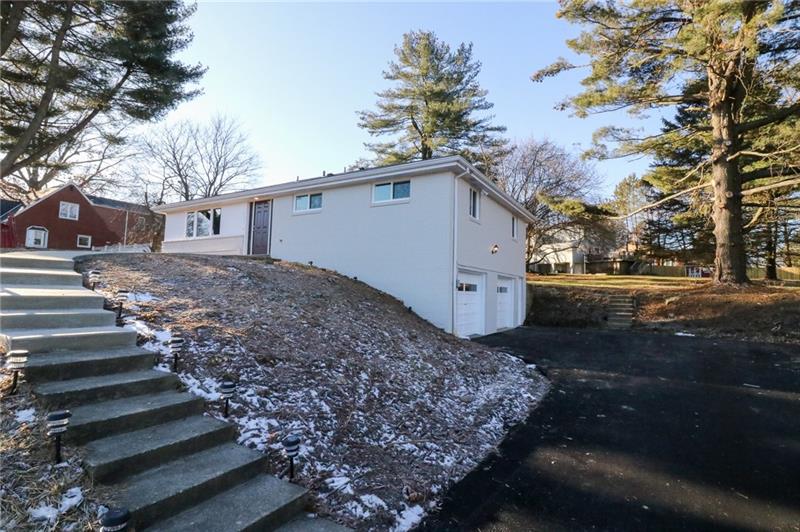 2279 Rochester Road Pittsburgh, PA 15237 - Photo 2 of 25 New Concrete Walkway to the Front Door and New Asphalt Driveway to the Two Car Garage.