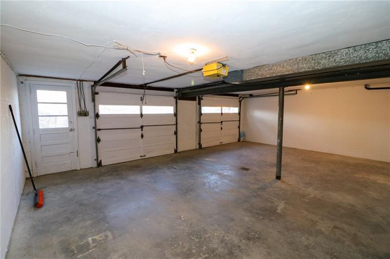 2279 Rochester Road Pittsburgh, PA 15237 - Photo 21 of 25 The Two-Car Garage with Man Door to the Driveway. One of the Garage Doors has an Automatic Opener.