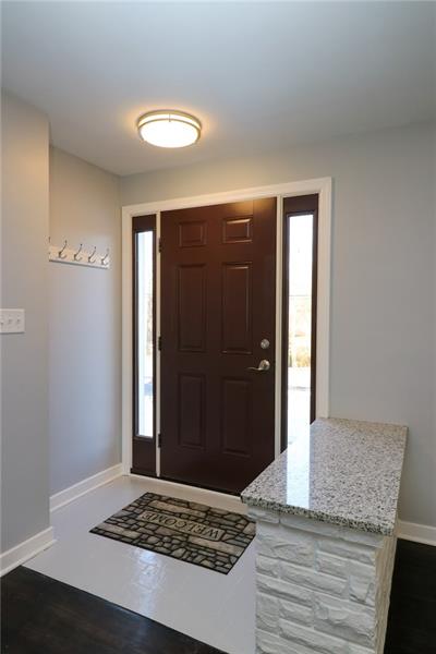 2279 Rochester Road Pittsburgh, PA 15237 - Photo 4 of 25 The Entryway with Matching Granite to the Kitchen Counters. Hooks installed for Added Convenience....