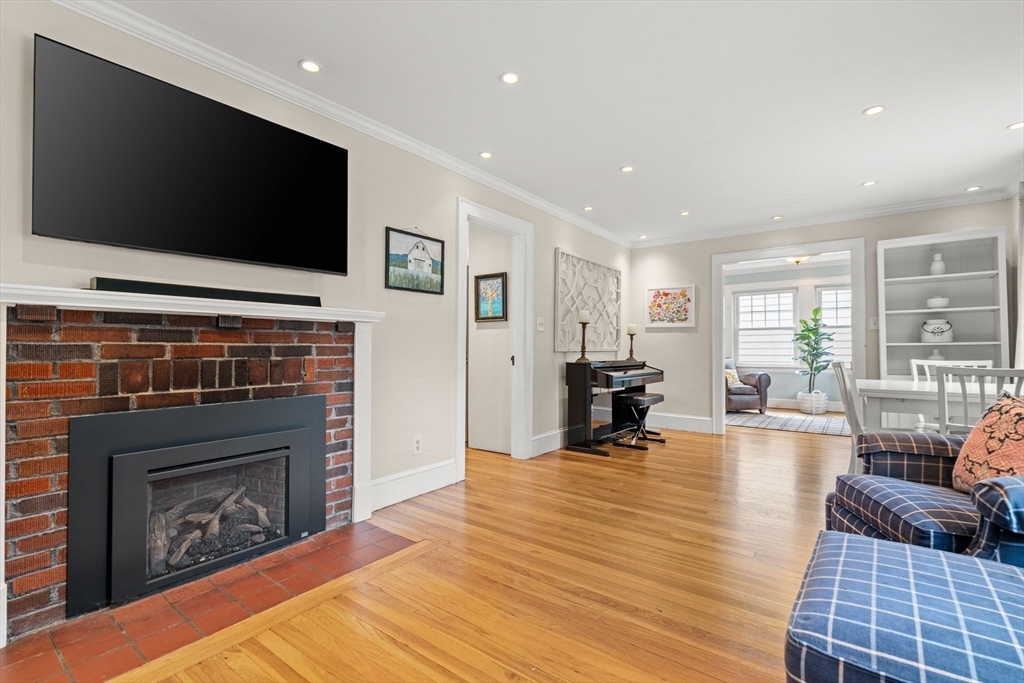 15 Grace Road Medford, MA 02155 - Photo 13 of 41 a living room with furniture and a flat screen tv