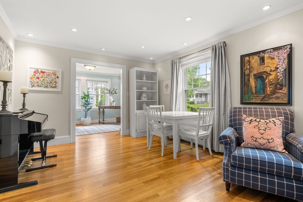 15 Grace Road Medford, MA 02155 - Photo 14 of 41 a living room with furniture a wooden floor and a large window