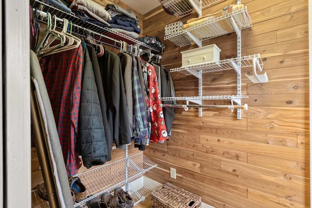 15 Grace Road Medford, MA 02155 - Photo 23 of 41 a view of walk in closet with clothes