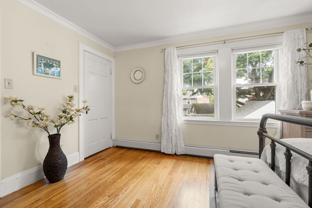 15 Grace Road Medford, MA 02155 - Photo 27 of 41 a view of empty room with wooden floor and fan