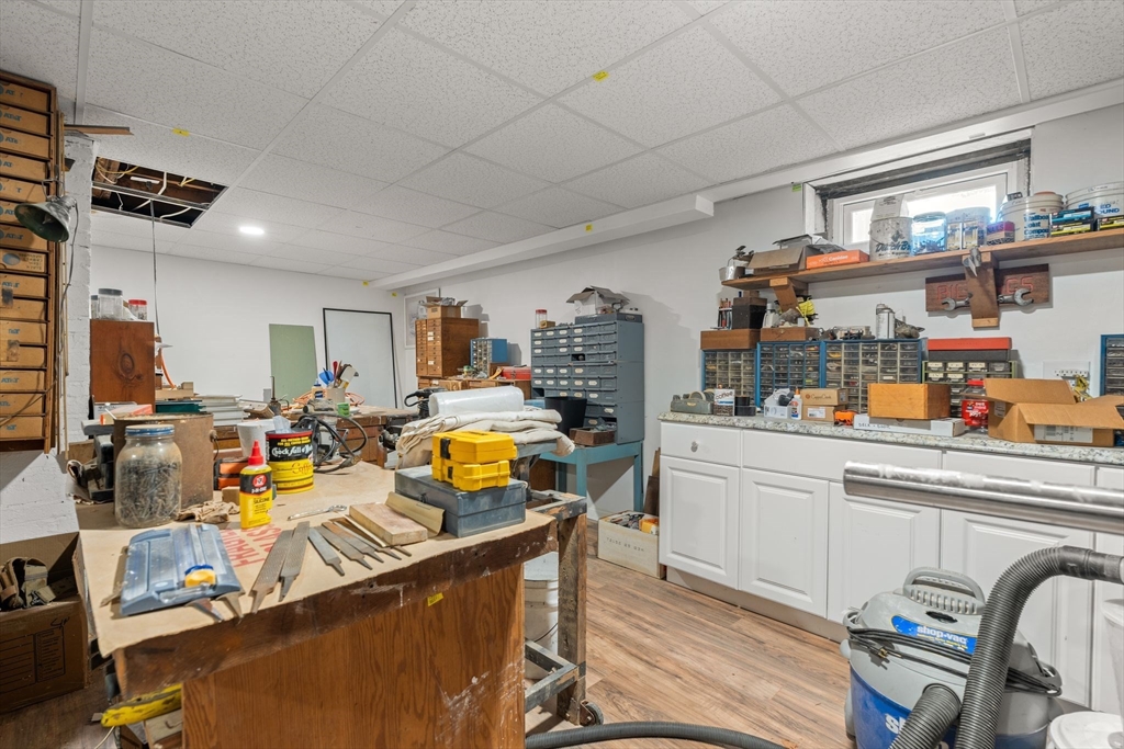15 Grace Road Medford, MA 02155 - Photo 36 of 41 a kitchen with stainless steel appliances granite countertop a sink and cabinets