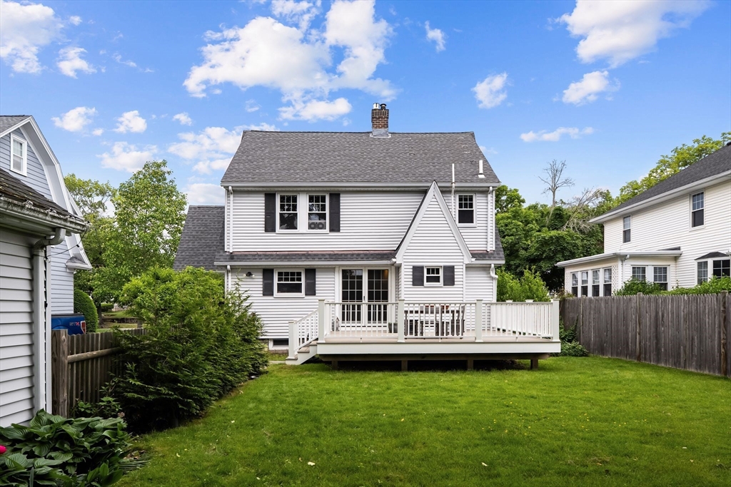 15 Grace Road Medford, MA 02155 - Photo 38 of 41 a front view of a house with a garden and deck