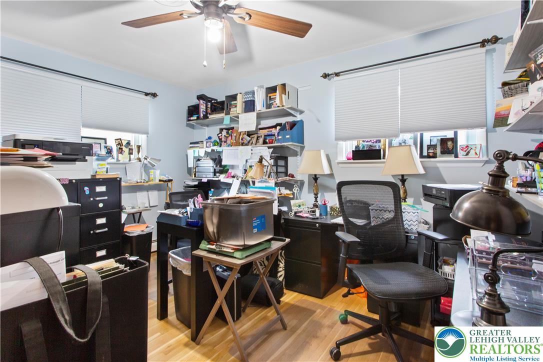 910 Gall Road Easton, PA 18040 - Photo 11 of 30 a living room with furniture a rug and a chandelier