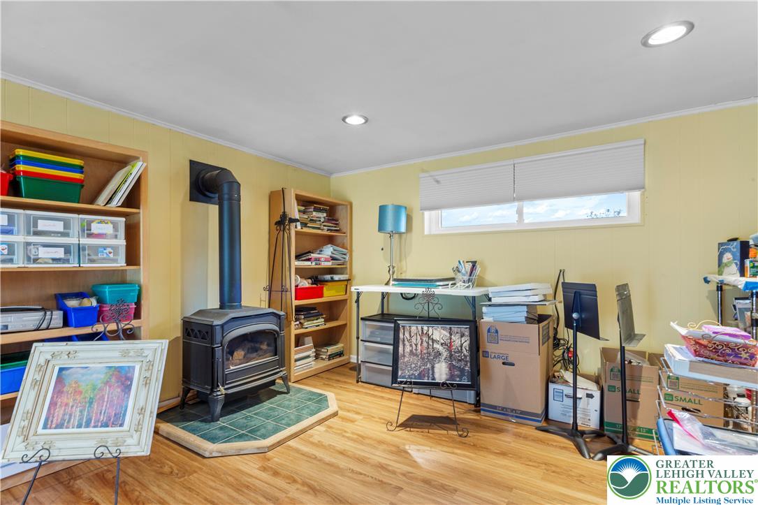 910 Gall Road Easton, PA 18040 - Photo 13 of 30 a living room with lots of furniture and a flat screen tv
