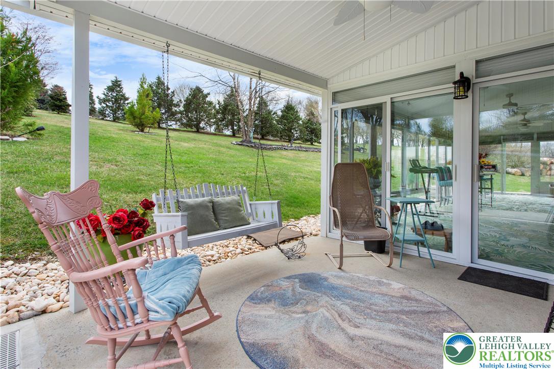 910 Gall Road Easton, PA 18040 - Photo 24 of 30 a view of a porch with furniture and backyard