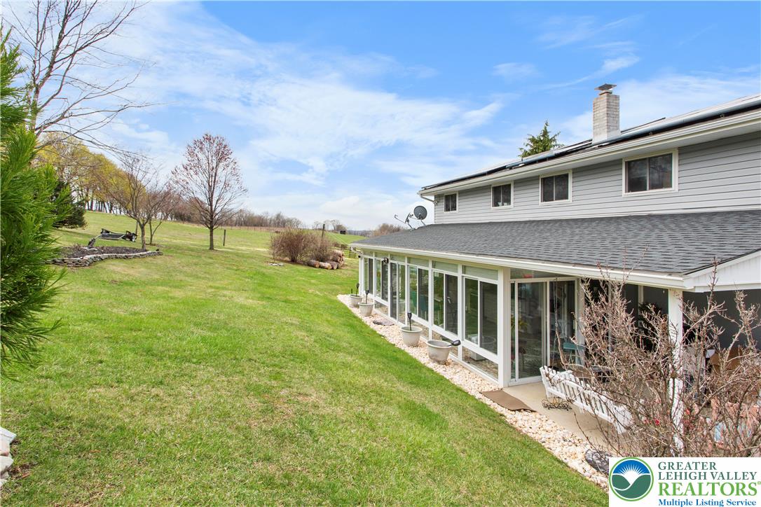 910 Gall Road Easton, PA 18040 - Photo 25 of 30 a view of a house with backyard and sitting area