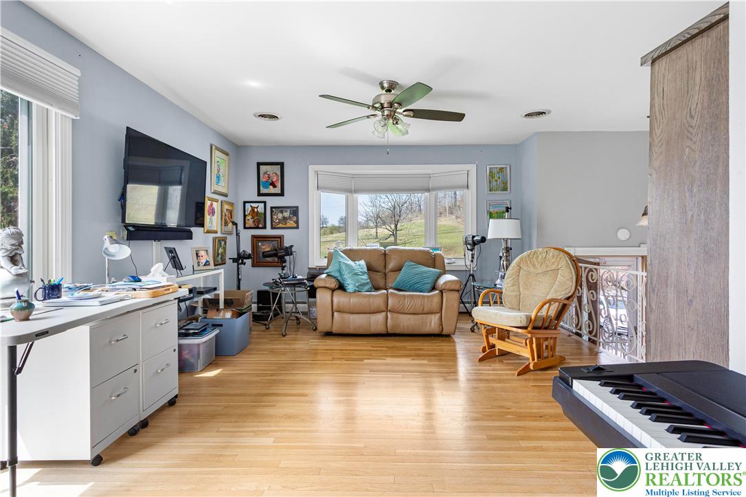 910 Gall Road Easton, PA 18040 - Photo 6 of 30 a living room with furniture and a flat screen tv