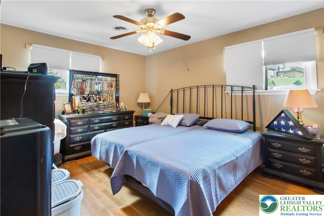 910 Gall Road Easton, PA 18040 - Photo 8 of 30 a bedroom with bed and wooden floor