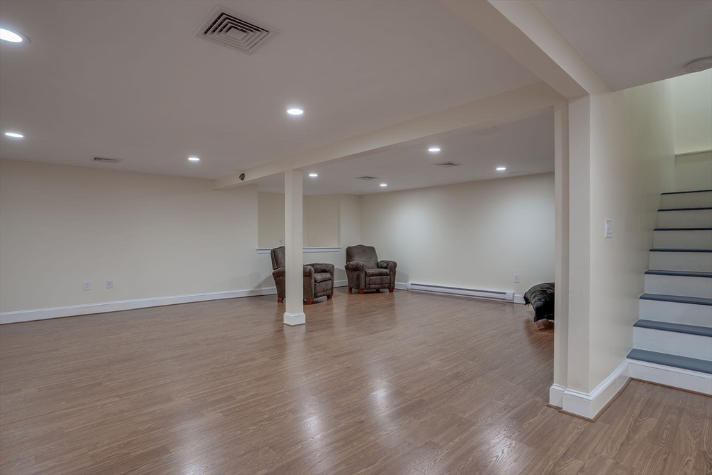34 Middleby Road Lexington, MA 02421 - Photo 38 of 41 a view of empty room with wooden floor
