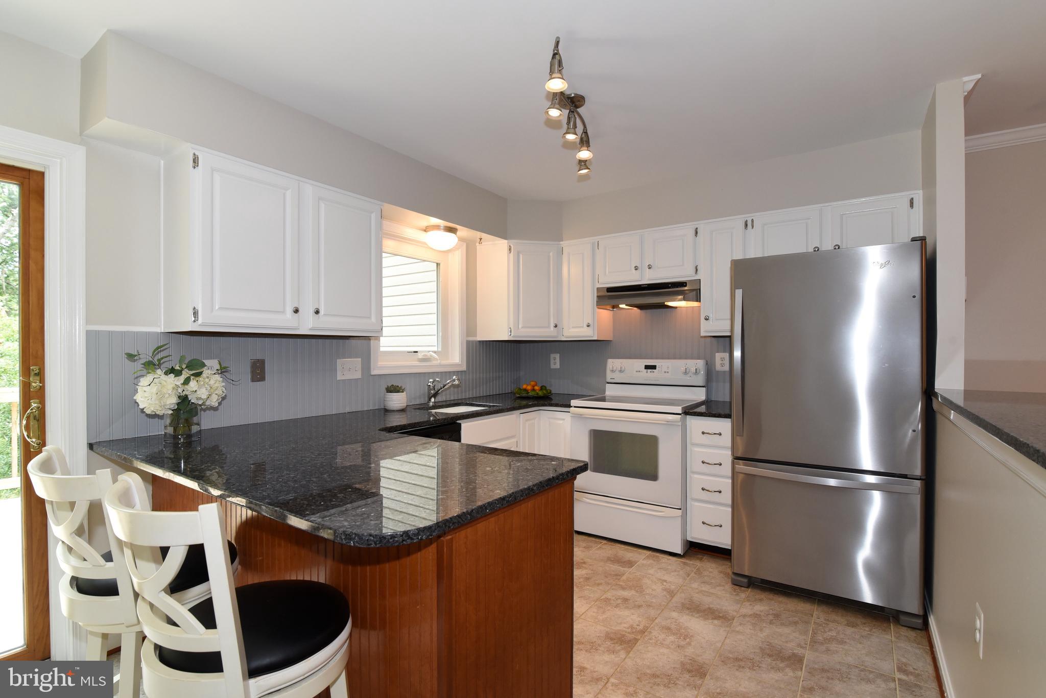11940 Sentinel Point Court Reston, VA 20191 - Photo 13 of 43 Great granite counter space!