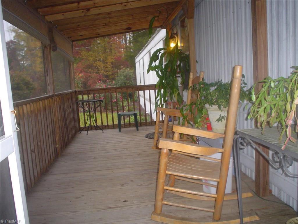 7107 Downsfield Road Randleman, NC 27317 - Photo 3 of 11 7'10" x 21'6" screened porch