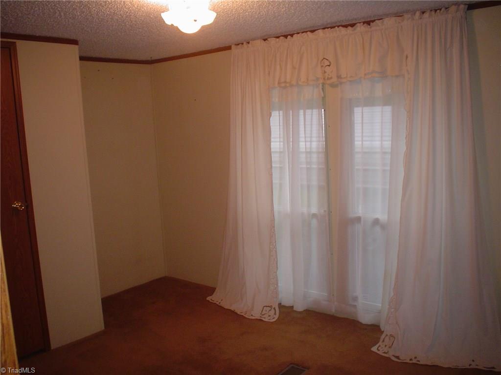 7107 Downsfield Road Randleman, NC 27317 - Photo 9 of 11 9'4" x 11' second bedroom
