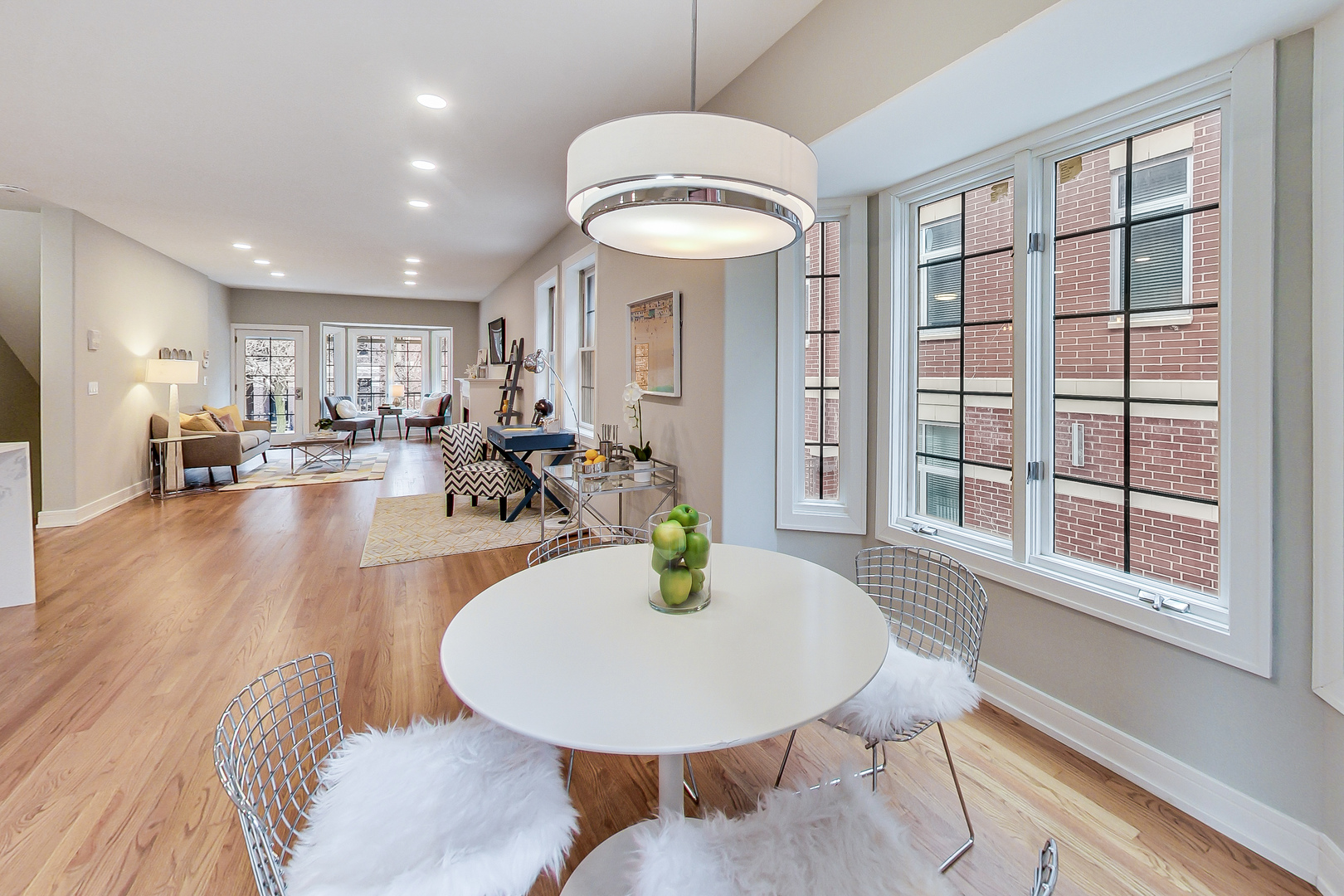 1036 West Monroe Street Chicago, IL 60607 - Photo 10 of 24 a view of a dining room with furniture window and wooden floor