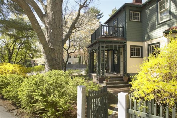 74 Larch Road Cambridge, MA 02138 - Photo 1 of 12 a front view of a house with a tree in it