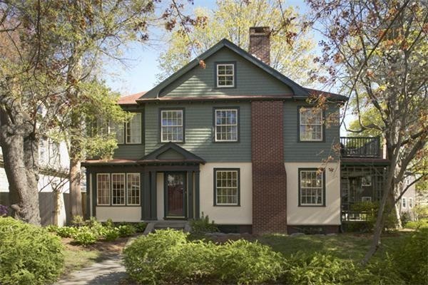74 Larch Road Cambridge, MA 02138 - Photo 2 of 12 a front view of a house with garden