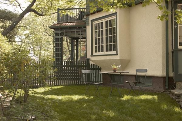 74 Larch Road Cambridge, MA 02138 - Photo 10 of 12 a front view of a house with swimming pool