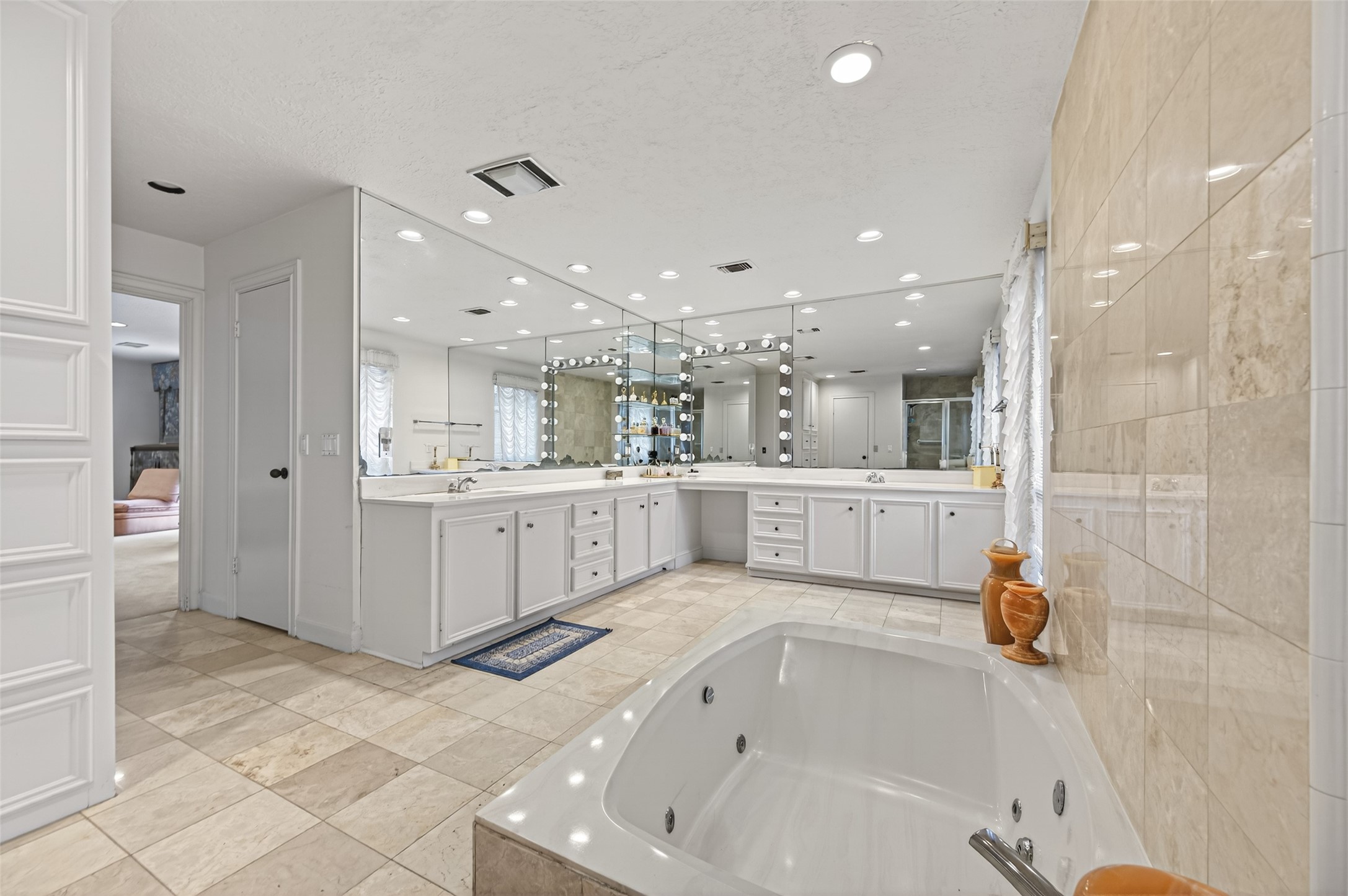 8103 Lake Edge Court Houston, TX 77071 - Photo 28 of 48 Primary bath designed with extensive vanity space and full-length mirror detail