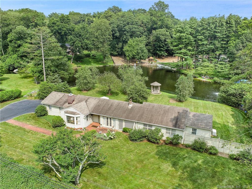 an aerial view of a house with a garden
