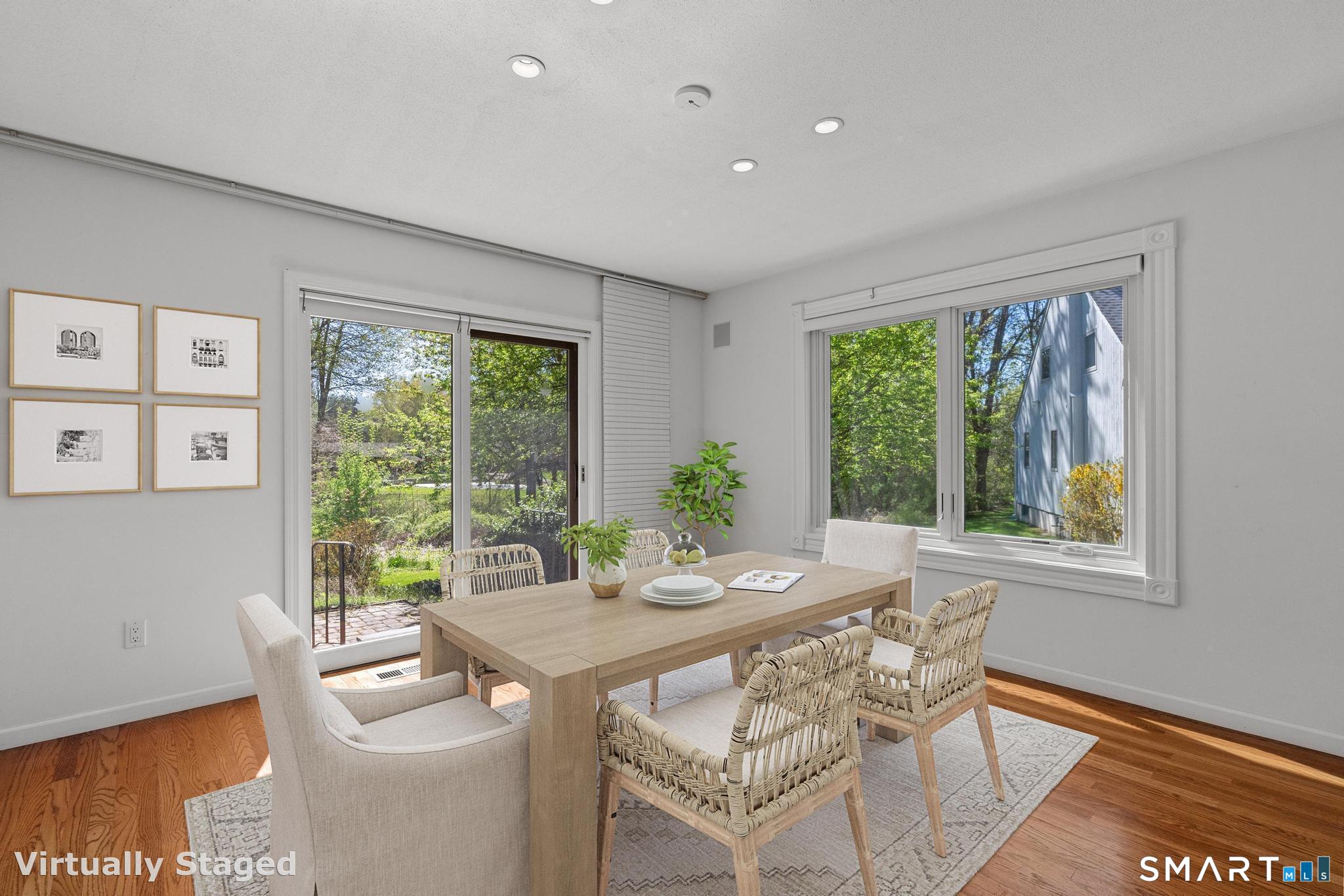 68 Deep Brook Harbor, Unit 68 Suffield, CT 06078 - Photo 13 of 40 Cozy dining area with sliders to the back patio.
