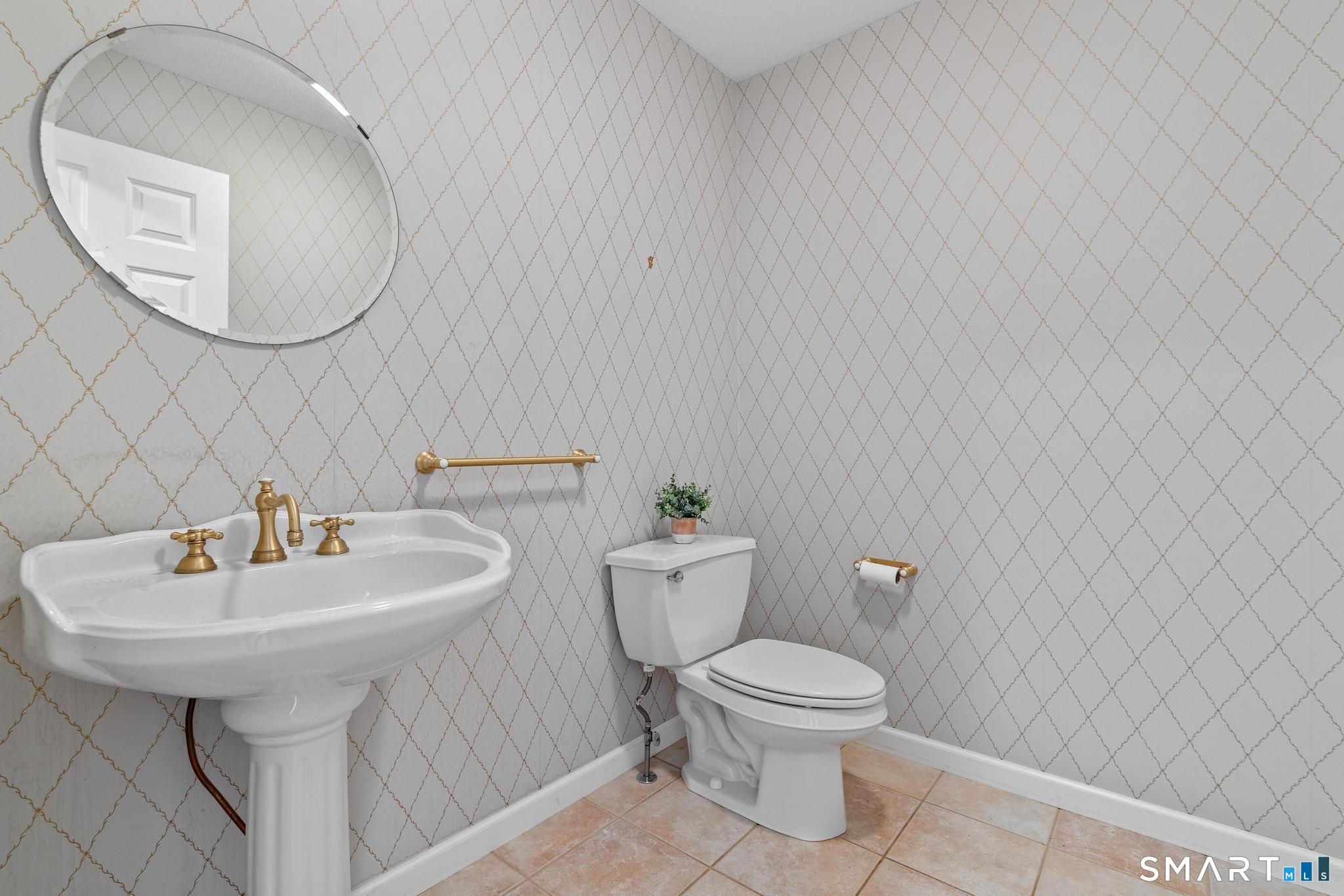 68 Deep Brook Harbor, Unit 68 Suffield, CT 06078 - Photo 31 of 40 Main floor powder room.