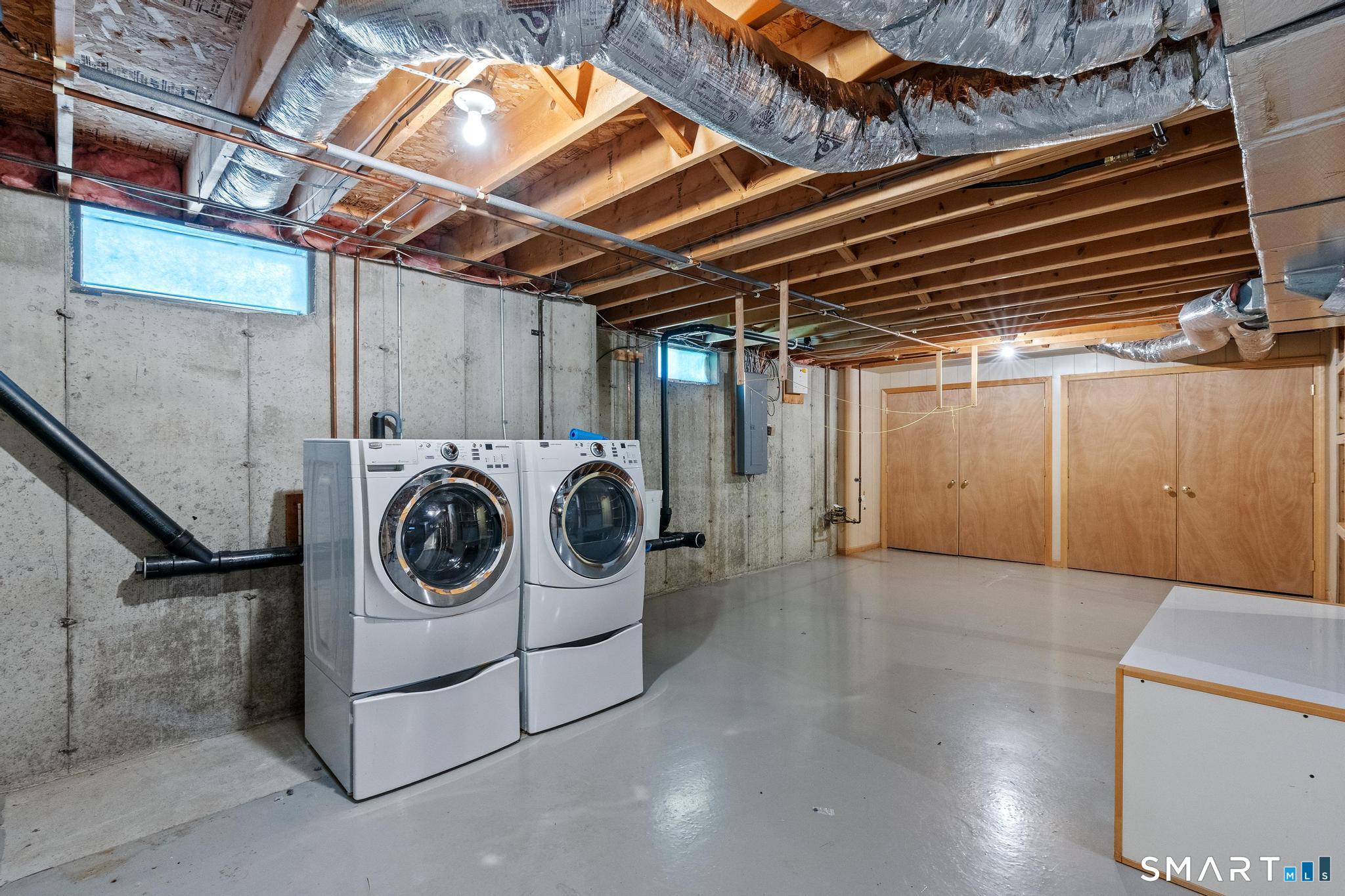 68 Deep Brook Harbor, Unit 68 Suffield, CT 06078 - Photo 38 of 40 Additional laundry in the basement.