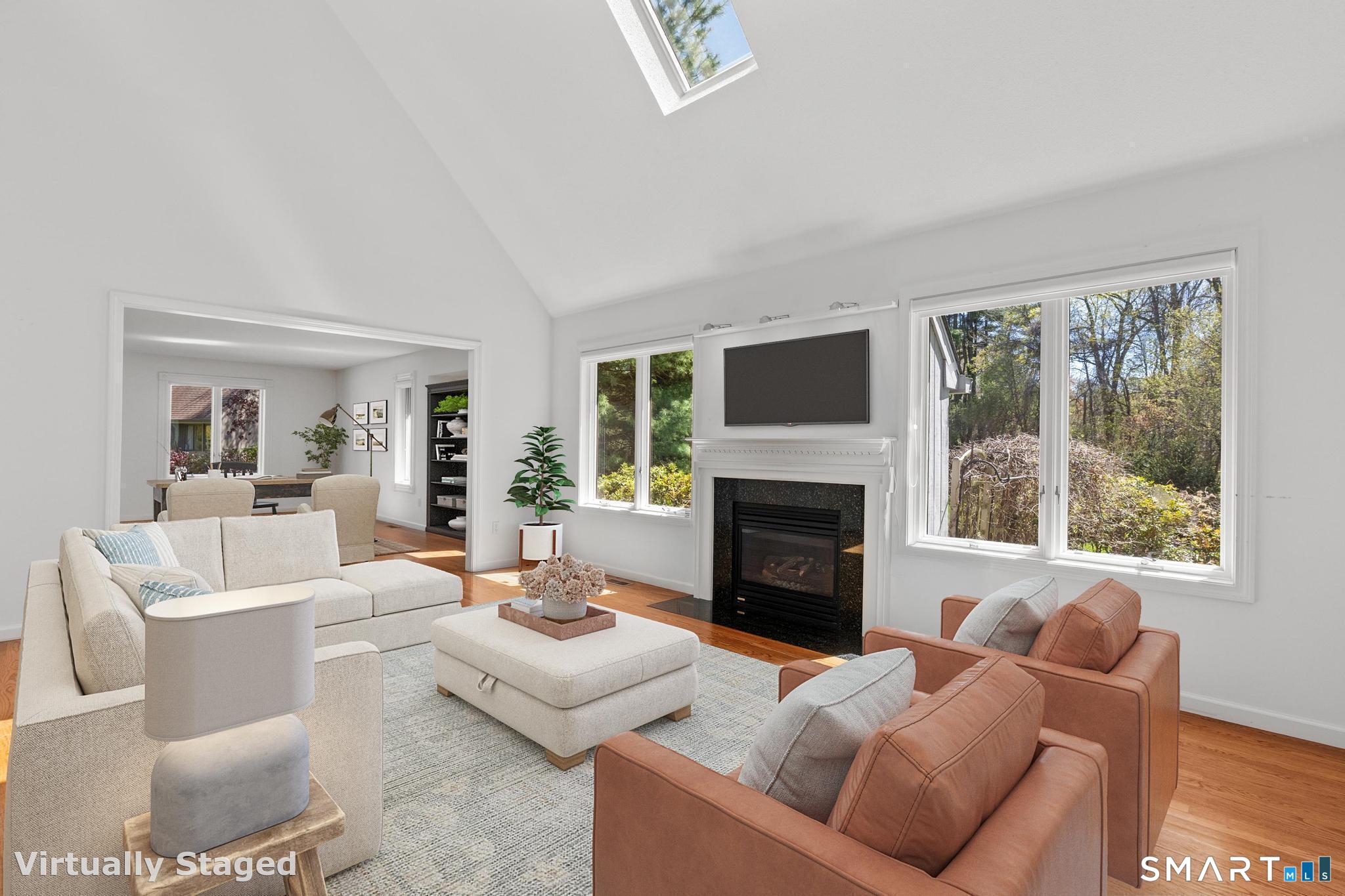68 Deep Brook Harbor, Unit 68 Suffield, CT 06078 - Photo 4 of 40 Bright and open living space on the main floor.