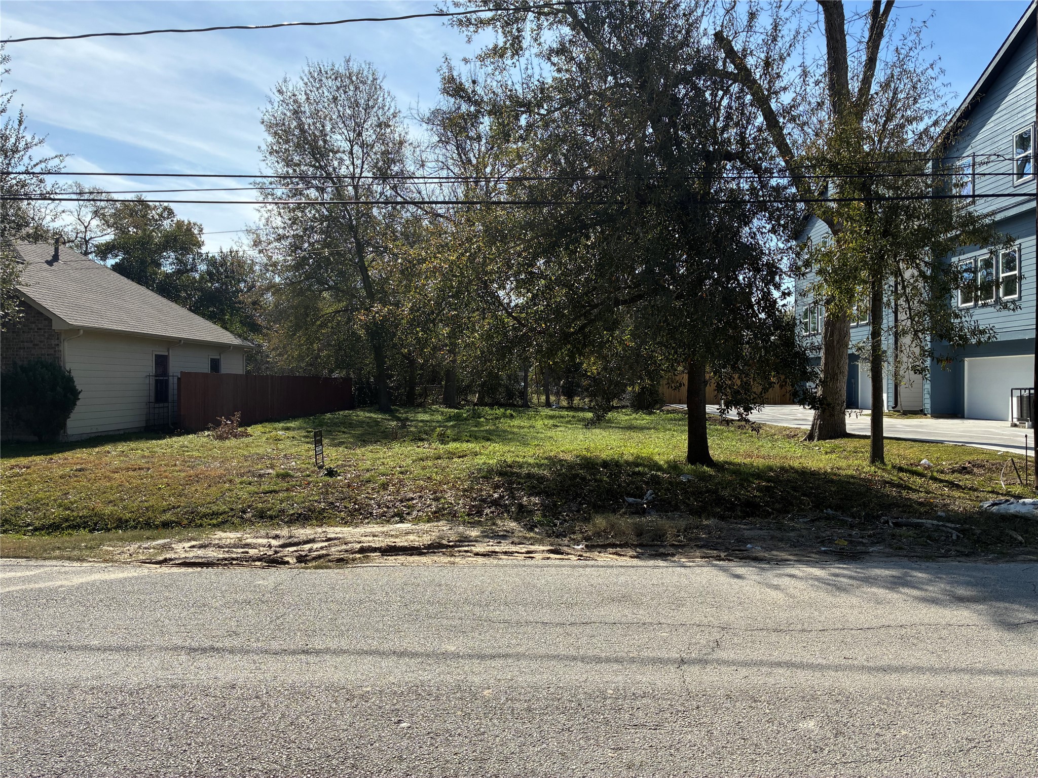 887 Lucky Street Houston, TX 77088 - Photo 1 of 6 a view of a house with a yard