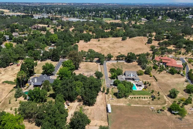 an aerial view of a city with lots of residential buildings