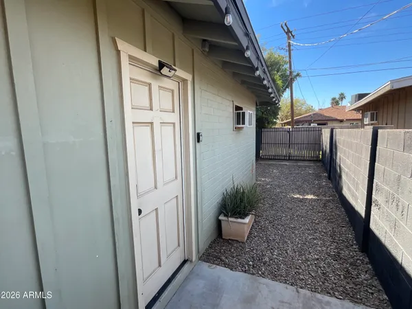 a view of a house with a porch