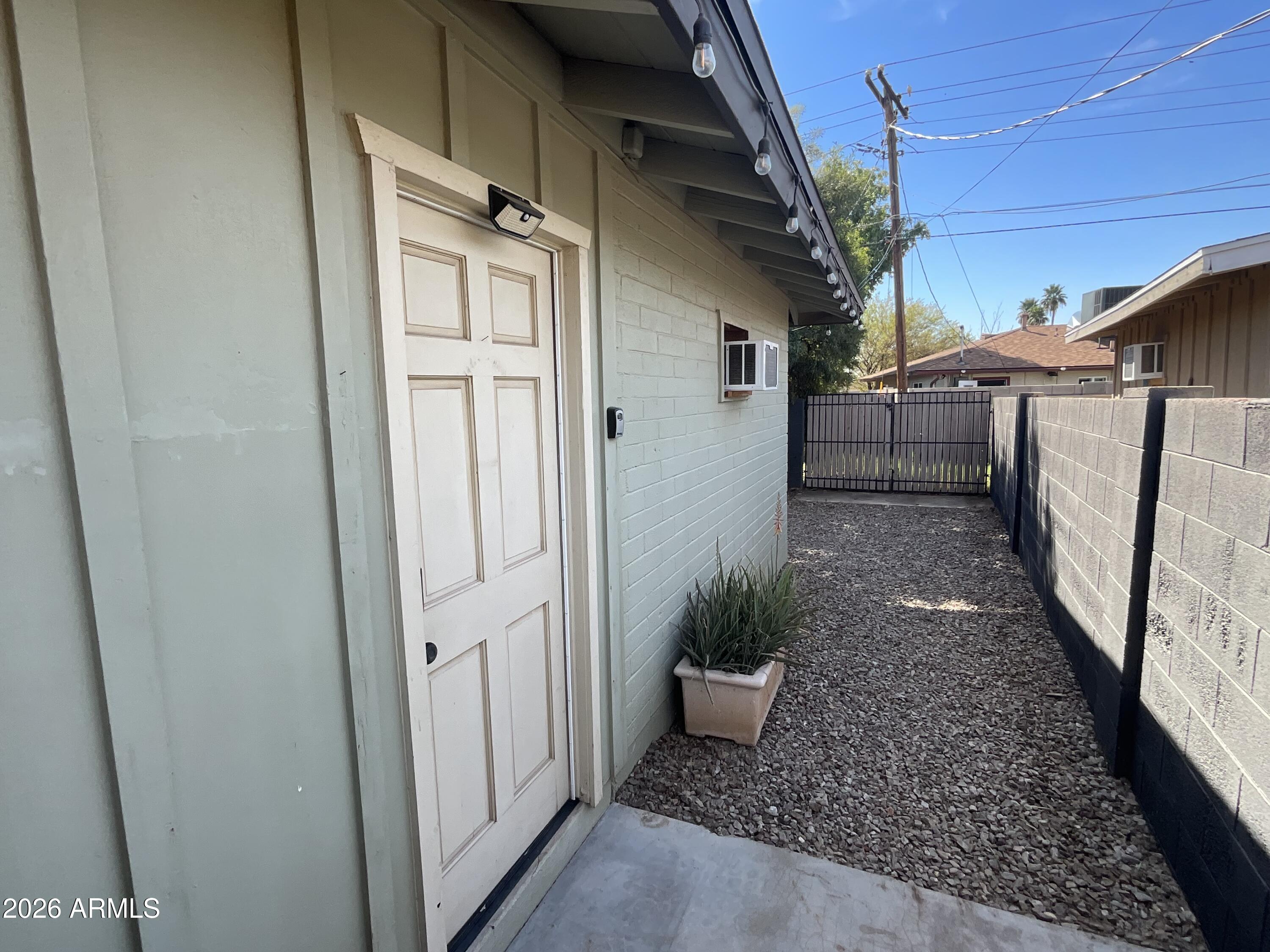 1601 West Lamar Road Phoenix, AZ 85015 - Photo 19 of 28 a view of a house with a porch