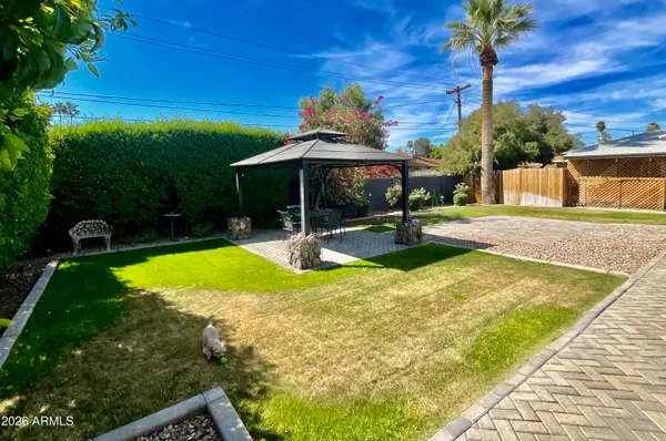 a view of swimming pool with a patio