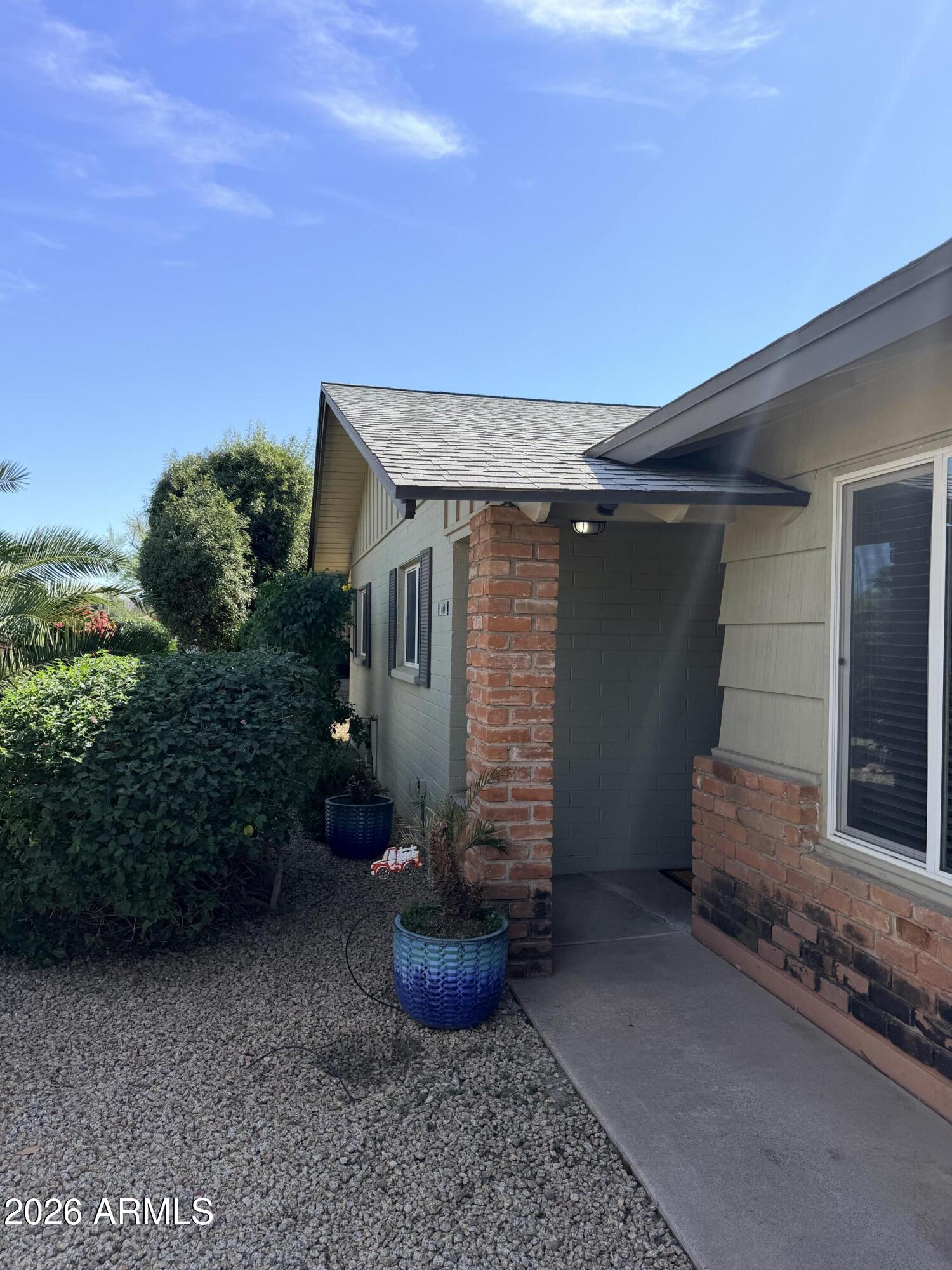 1601 West Lamar Road Phoenix, AZ 85015 - Photo 3 of 28 a house with lots of plants
