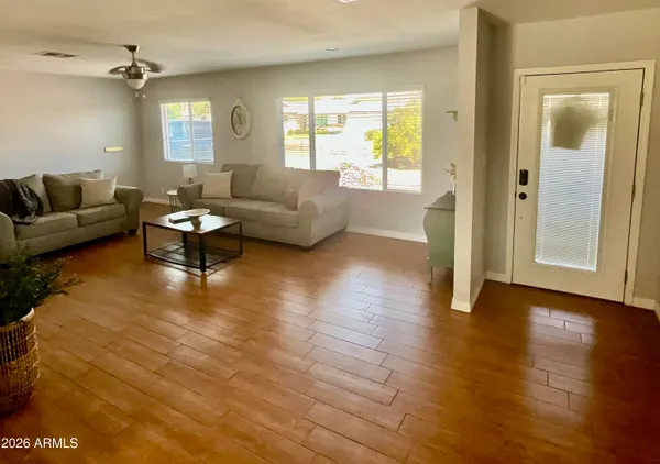 a living room with furniture and a window