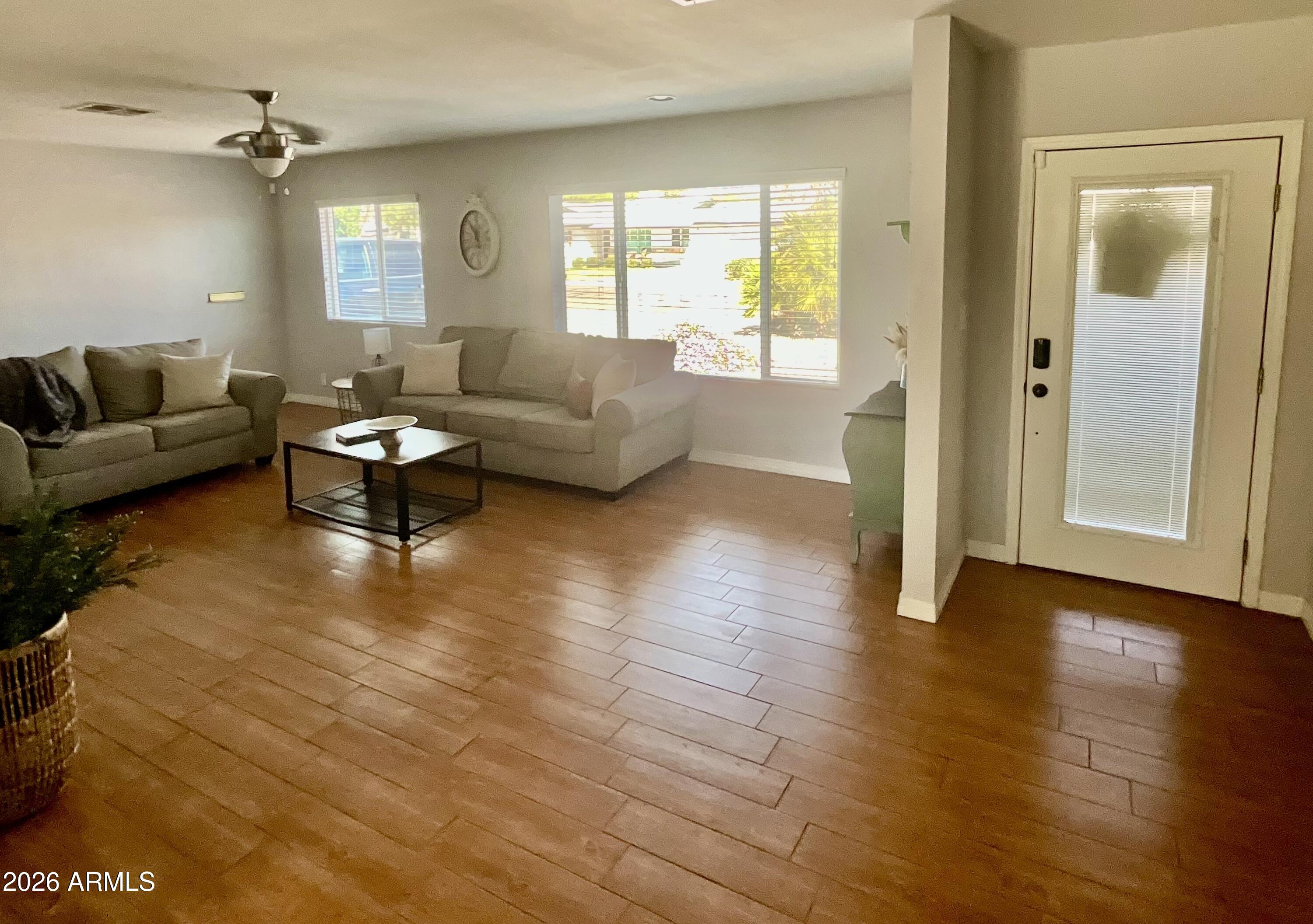 1601 West Lamar Road Phoenix, AZ 85015 - Photo 4 of 28 a living room with furniture and a window