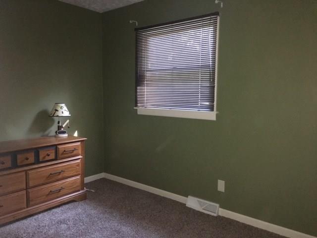 741 Wolf Avenue Rochester, PA 15074 - Photo 13 of 22 a view of room with window and dresser